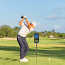 Load image into Gallery viewer, GPOD Phone Holder with an Iphone Mounted to the magnetic head which is used to film a golfer&#39;s golf swing
