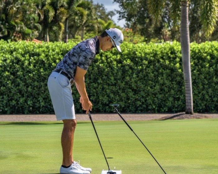 GPOD magsafe golf phone caddy inserted into the ground to film putting swing. A tripod cannot film this angle.